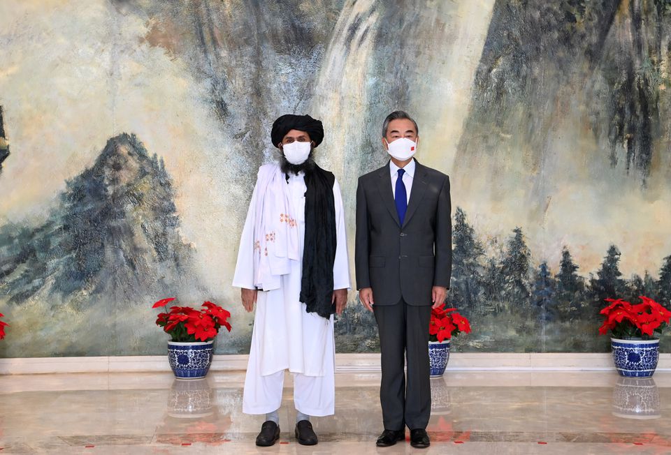 China's foreign minister Wang Yi meets Taliban political chief 'Mullah Abdul Ghani Baradar'.