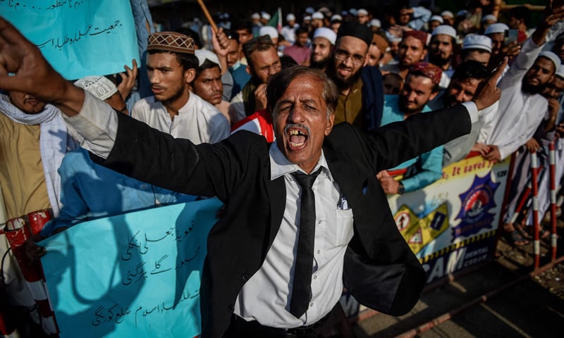 PDM (Pakistan Democratic Movement) activists protests and shouts slogans against rising inflation in Pakistan