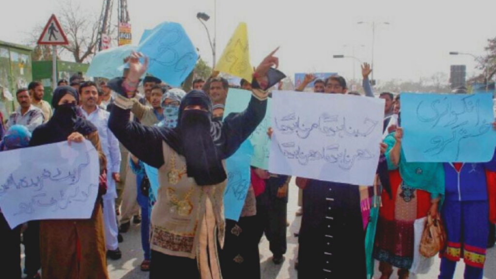 Teachers chanting slogan against governments decision to place Islamabad's schools under Mayor